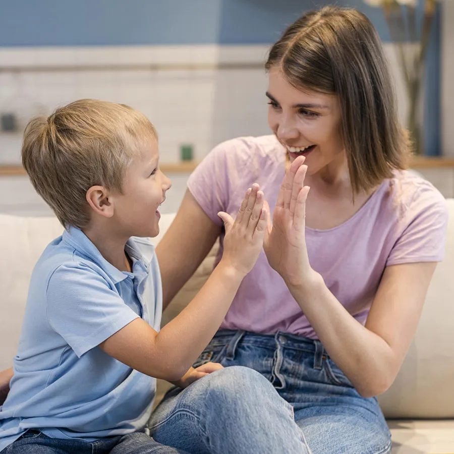 portrait-adorable-son-playing-with-mom-min